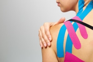 The main proposed benefits of Kinesio Tape include reduction of pain, protection of weak areas, increasing sensory input and improved performance.